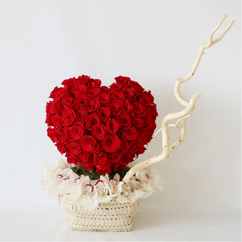 Red rose heart with cymbidium orchids in a basket red rose heart surrounded by white cymbidium orchids and salex on a handmade basket
