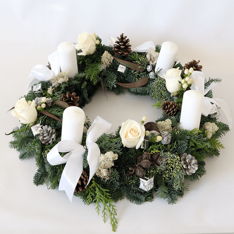 White Wreath Style Advent Arrangement round white wreath arrangement