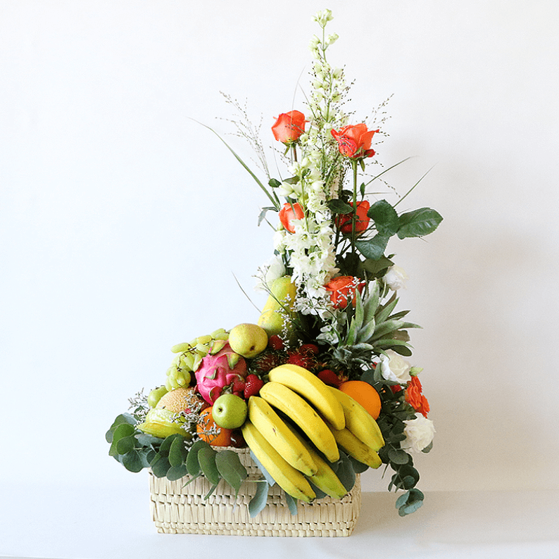 Tropical Fruit Basket_2 tropical fruit in a basket with flowers