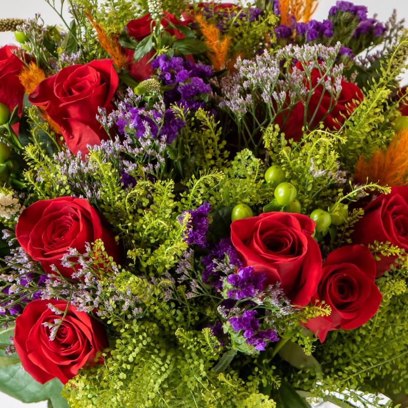 elena close up of red, purple and orange bouquet