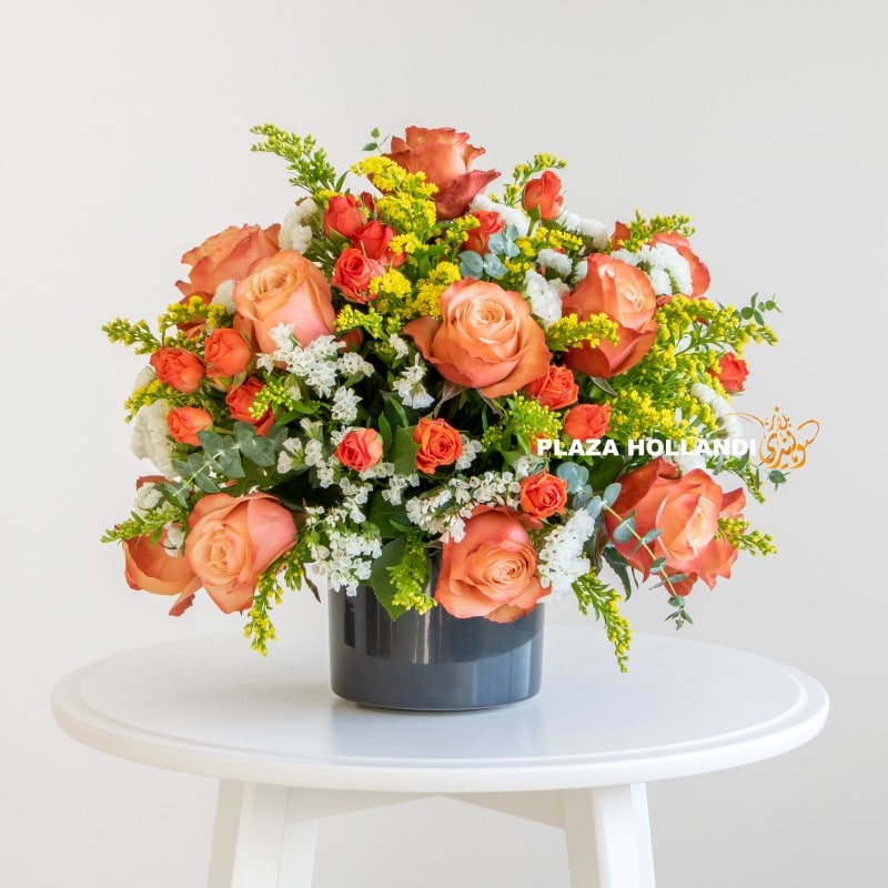Latifa Plaza Hollandi Orange, yellow and white flower arrangement