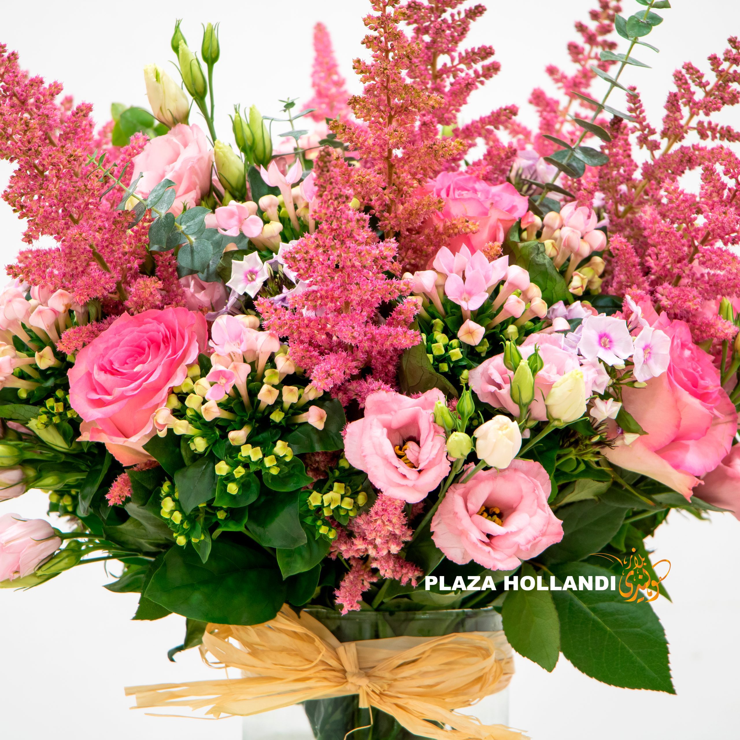 A beautiful bouquet pink flowers in a glass vase. beautiful bouquet full of pink flowers in a glass vase.