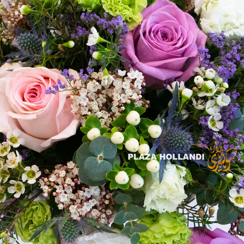 Q4 pink, purple, green and white flower arrangement
