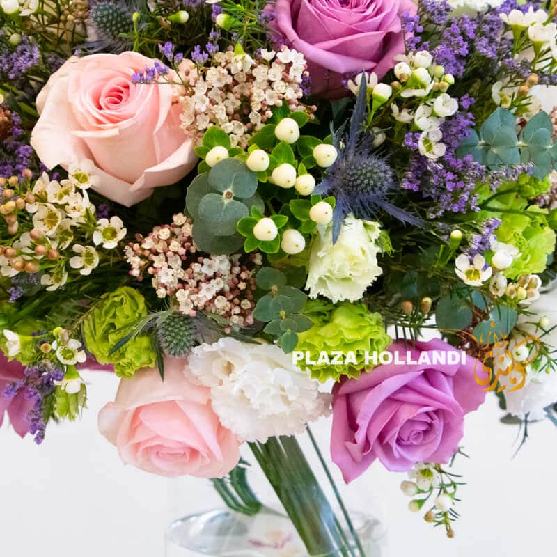 Q5 pink, purple, green and white flower arrangement