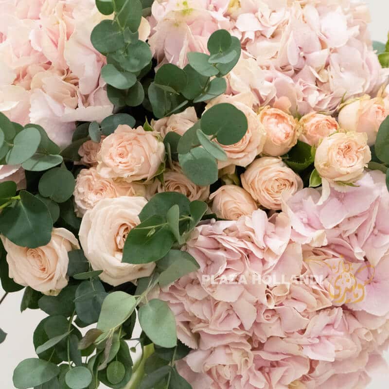 hydrangea bouqouet 2 pink hydrangea, roses and spray roses in a bouquet