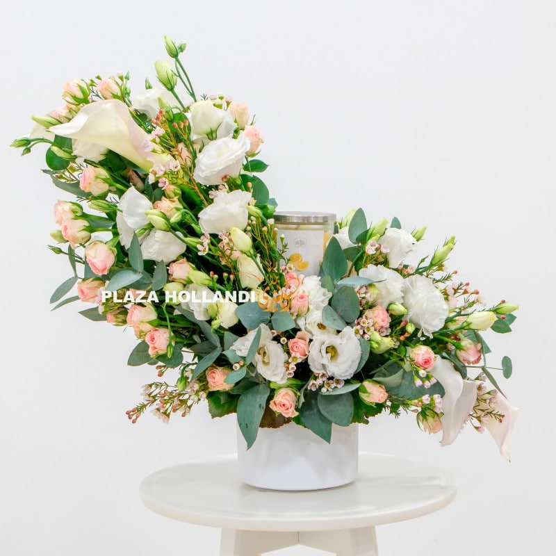 3.1 Pink and white flower arrangement with a candle