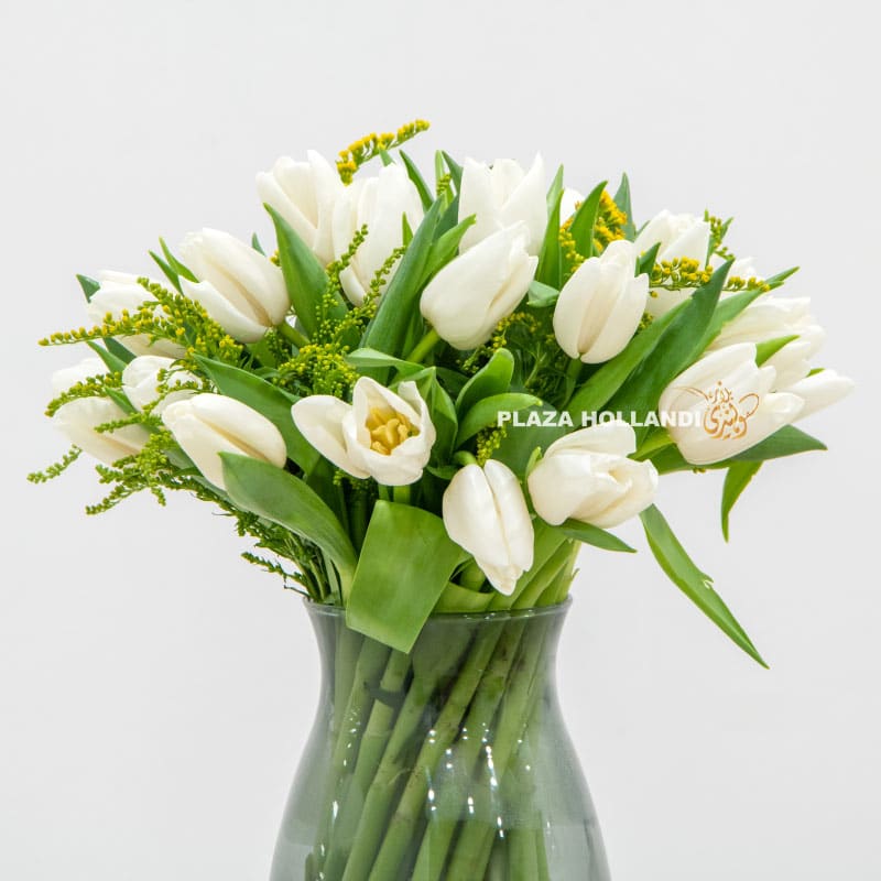 1.2 White Tulip bouquet in a glass vase with solidago