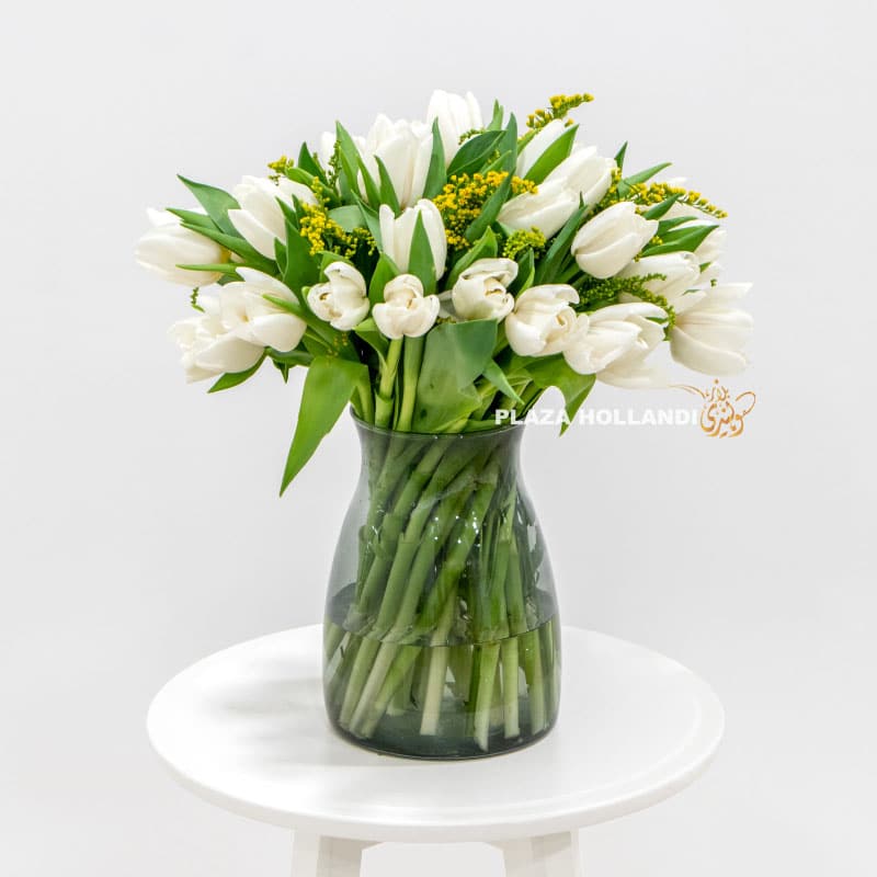 1.3 White Tulip bouquet in a glass vase