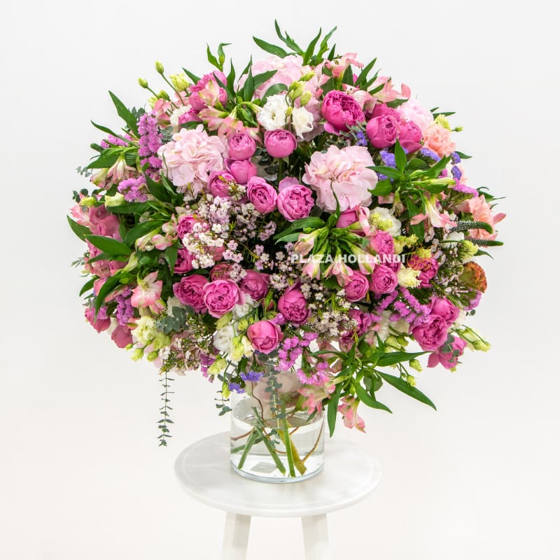 2.2 pink flower arrangement in a glass vase