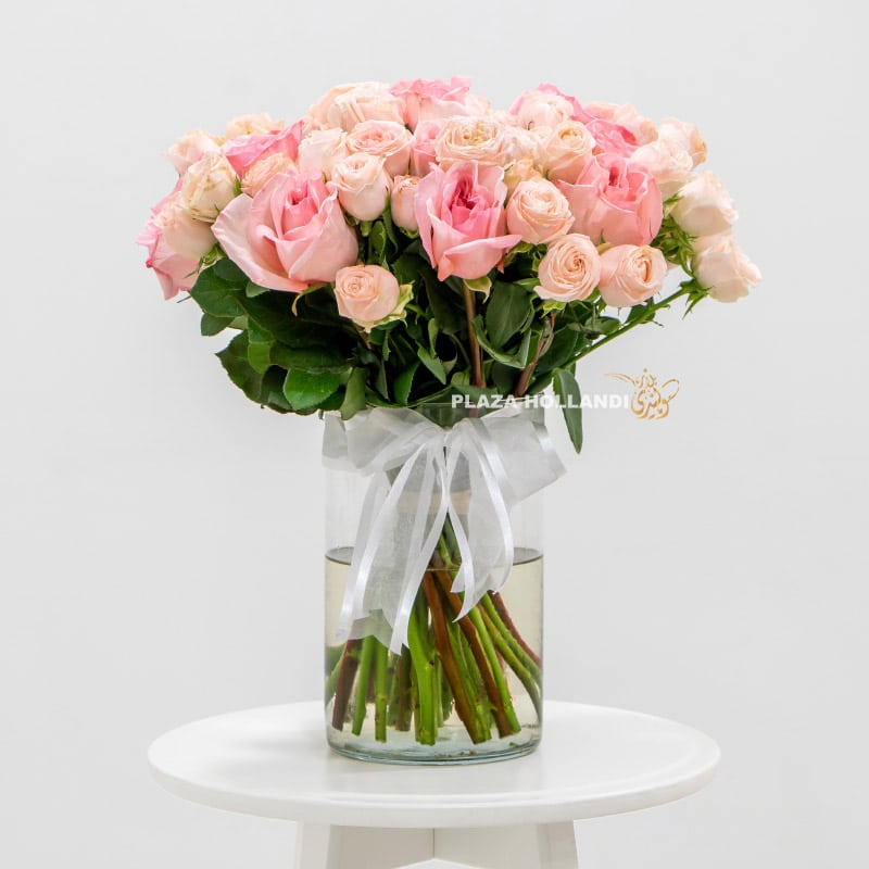 3 Pink roses in a glass vase