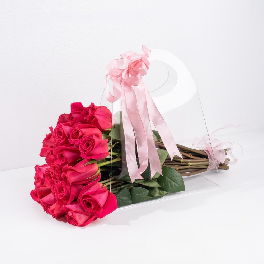 4 Rosy Elegance: Pink Roses in a Chic Gift Bag